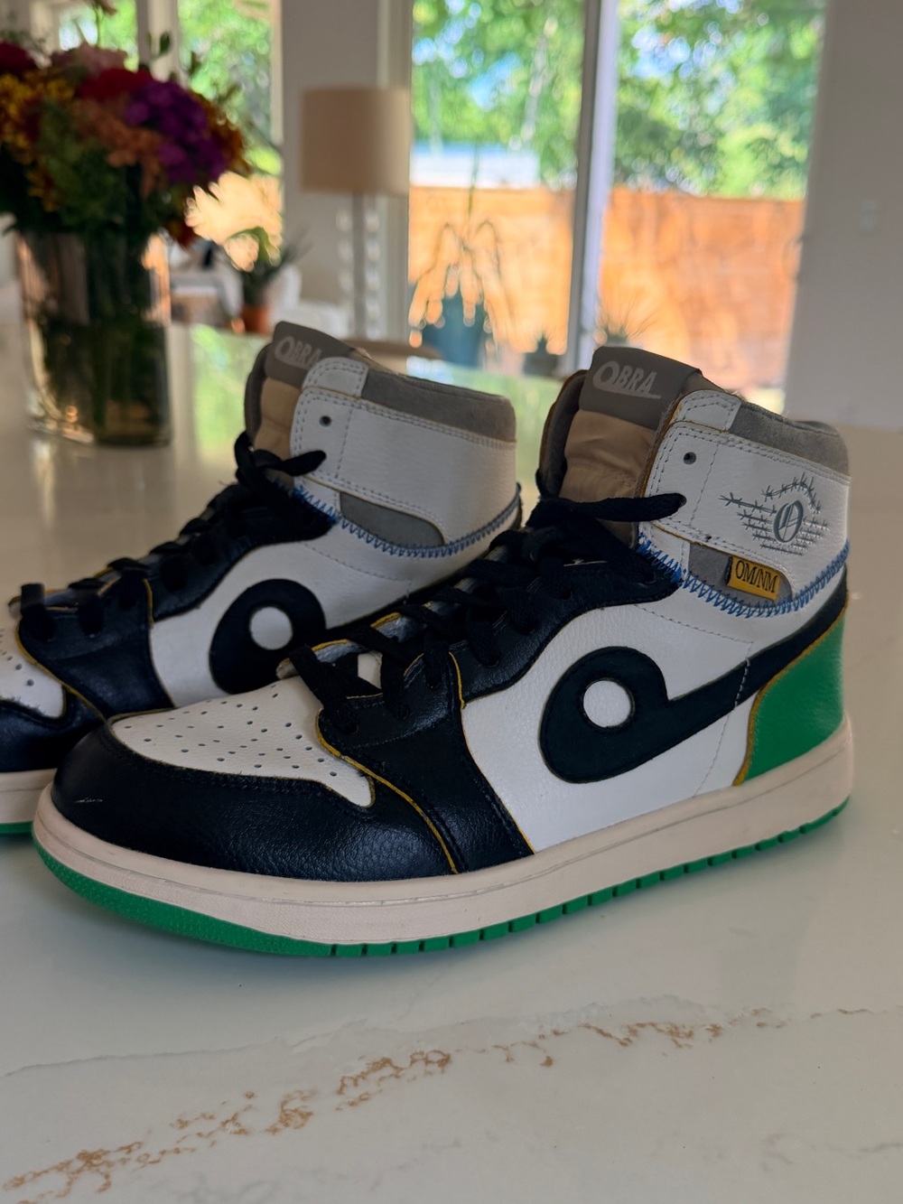 Obra Market Jay 1 high top sneakers in green/white colorway.